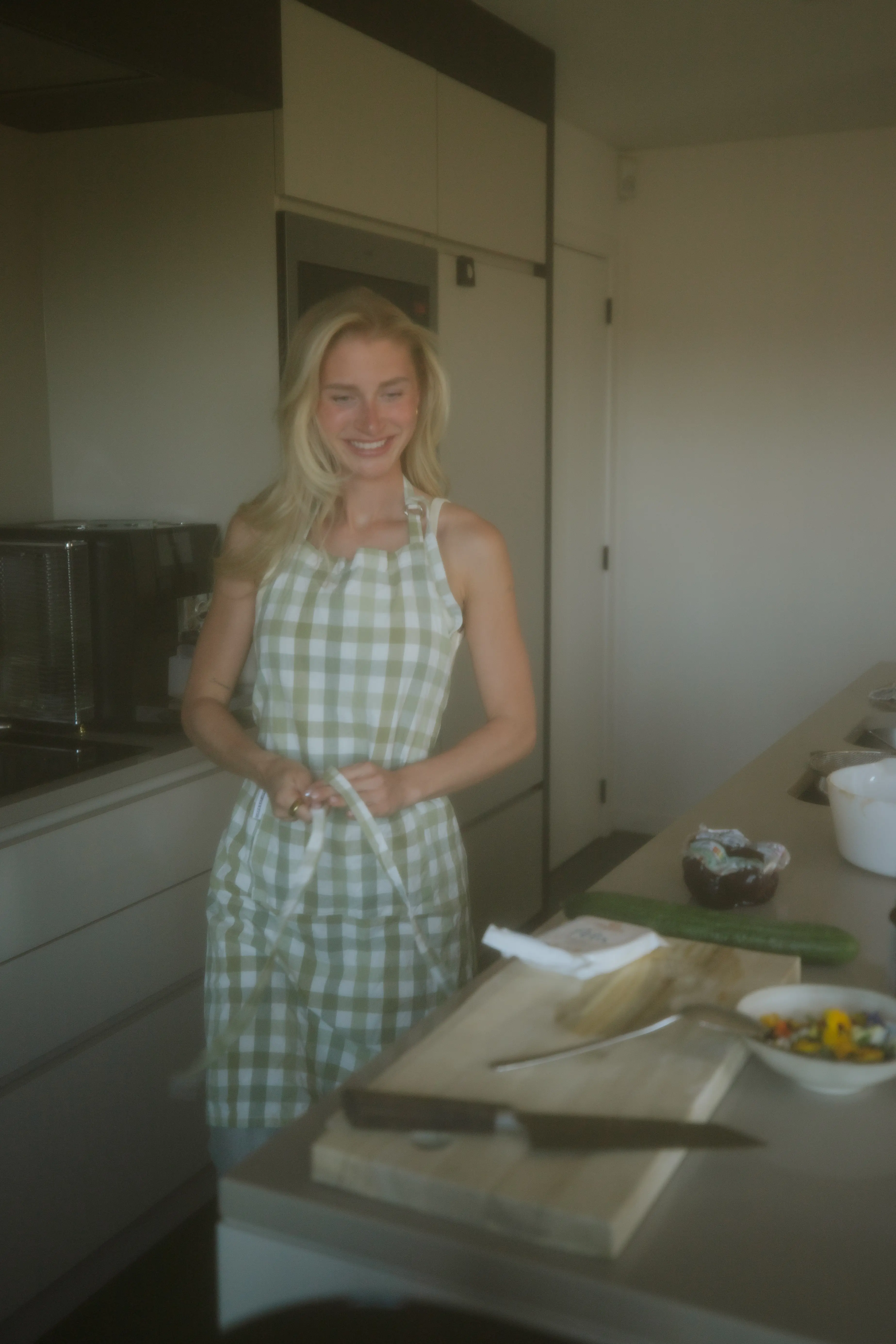 Wearing an apron, captured on film